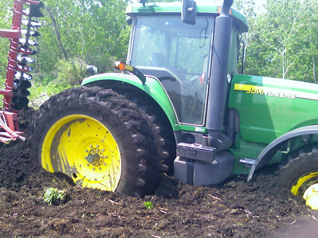 Stuck in the mud with no way to plant? You&#039;re not alone. DTN Contributing Analyst Elaine Kub outlines the market implications of prevented planting. (Photo courtesy of Ben Riensche)